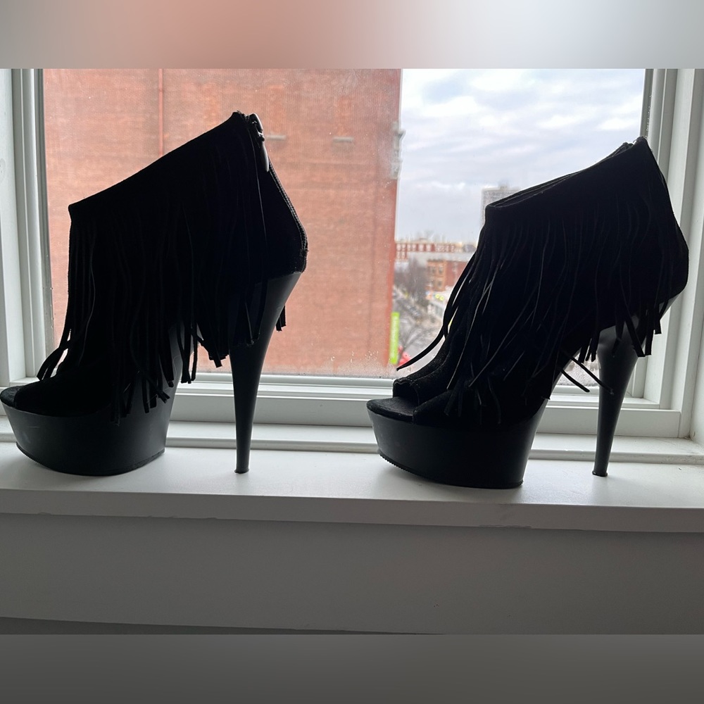 Sexy and COMFY  fringe stiletto peep toe booties. Made from 100% suede leather.